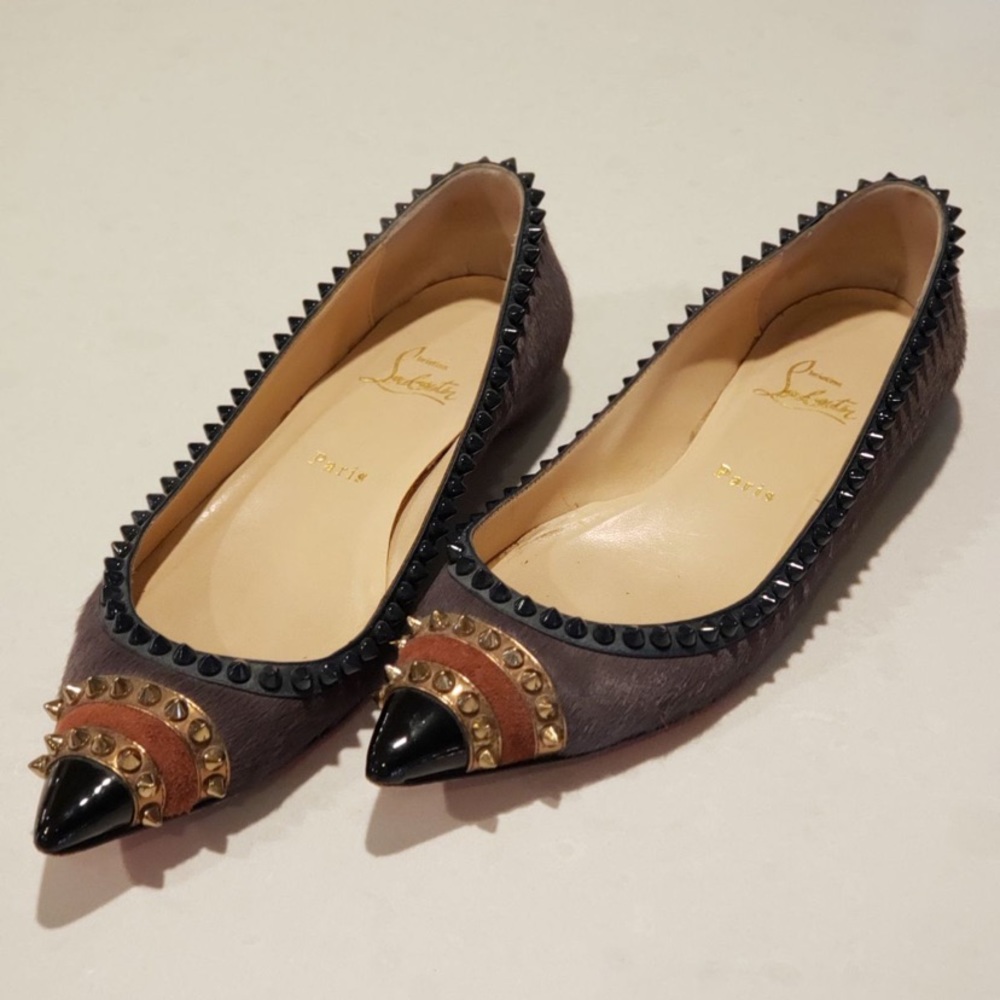 Christian Louboutin pony hair grey flats w/studs, gently used condition. Size 39